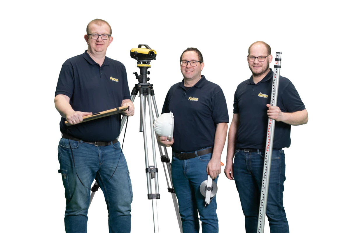 Vermessung mit Stativ und Nivellierlatte